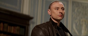 Movie still from “xXx” (2002), directed by Rob Cohen – A person wearing a leather jacket; Close Up shot, Low angle