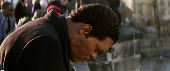 Movie still from “xXx” (2002), directed by Rob Cohen – A person smoking a cigarette; Close Up shot, High angle