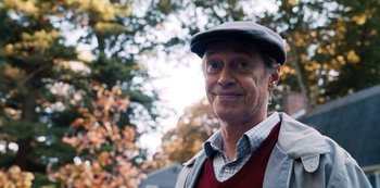 Movie still from “Hubie Halloween” (2020), directed by Steven Brill – An older man wearing a hat and a vest; Close Up shot, Over the shoulder angle