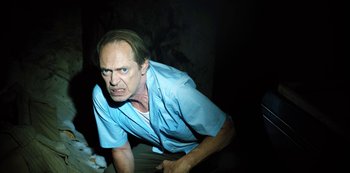 Movie still from “Hubie Halloween” (2020), directed by Steven Brill – Medium shot, High angle