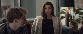 Movie still from “Human Capital” (2019), directed by Marc Meyers – A person wearing a jacket; Close Up shot, Over the shoulder angle