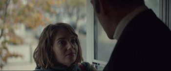 Movie still from “Human Capital” (2019), directed by Marc Meyers – A man and a woman are looking at each other; Close Up shot, Over the shoulder angle