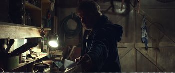 Movie still from “Hunt for the Wilderpeople” (2016), directed by Taika Waititi – A man holding a paper in his hands; Medium shot, Low angle