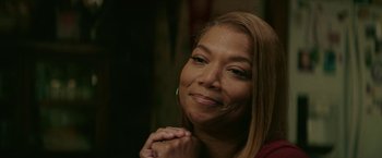 Movie still from “Hustle” (2022), directed by Jeremiah Zagar – A person with their hands clasped together; Close Up shot, Over the shoulder angle