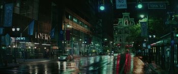 Movie still from “Hustle” (2022), directed by Jeremiah Zagar – A city street at night lit by street lights; Extreme Wide shot, High angle