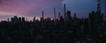 Movie still from “Hustle” (2022), directed by Jeremiah Zagar – A view of a city skyline at sunset; Extreme Wide shot, High angle