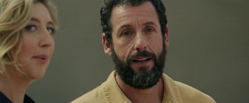 Movie still from “Hustle” (2022), directed by Jeremiah Zagar – A person with a beard; Close Up shot, Over the shoulder angle