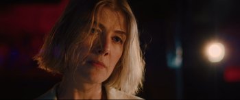 Movie still from “I Care a Lot” (2020), directed by J Blakeson – A person with long hair; Close Up shot, Low angle