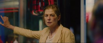 Movie still from “I Care a Lot” (2020), directed by J Blakeson – A person wearing a jacket; Close Up shot, Over the shoulder angle