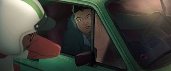 Movie still from “I Lost My Body” (2019), directed by Jérémy Clapin – A man looking out the window of a green car; Close Up shot, High angle