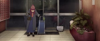 Movie still from “I Lost My Body” (2019), directed by Jérémy Clapin – A woman standing in front of an open door with luggage; Wide shot, High angle