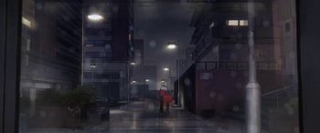 Movie still from “I Lost My Body” (2019), directed by Jérémy Clapin – A person walking down a street in the rain; Extreme Wide shot, High angle