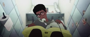 Movie still from “I Lost My Body” (2019), directed by Jérémy Clapin – An animated man is holding a phone in his hand; Close Up shot, High angle