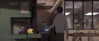 Movie still from “I Lost My Body” (2019), directed by Jérémy Clapin – Two people are walking through a hallway holding hands; Medium shot, High angle