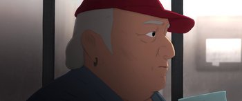 Movie still from “I Lost My Body” (2019), directed by Jérémy Clapin – An old man with a red hat is looking at the camera; Extreme Close Up shot, Low angle