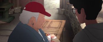 Movie still from “I Lost My Body” (2019), directed by Jérémy Clapin – An old man sitting at a table with a cup of coffee; Close Up shot, High angle