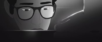 Movie still from “I Lost My Body” (2019), directed by Jérémy Clapin – A person with glasses is looking at a computer screen; Extreme Close Up shot, Low angle