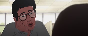 Movie still from “I Lost My Body” (2019), directed by Jérémy Clapin – An animated man with glasses is talking to a woman in an office setting; Close Up shot, Over the shoulder angle