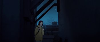 Movie still from “I Lost My Body” (2019), directed by Jérémy Clapin – A woman in a yellow jacket standing in the dark; Wide shot, Low angle