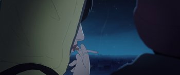 Movie still from “I Lost My Body” (2019), directed by Jérémy Clapin – A person smoking a cigarette in the dark; Extreme Close Up shot, Over the shoulder angle