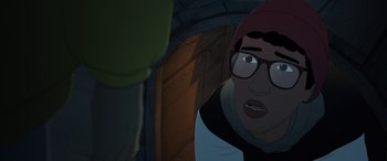 Movie still from “I Lost My Body” (2019), directed by Jérémy Clapin – An animated person wearing glasses and a hat; Close Up shot, Over the shoulder angle