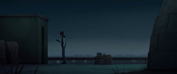 Movie still from “I Lost My Body” (2019), directed by Jérémy Clapin – A man standing next to a crate of beer; Extreme Wide shot, Over the shoulder angle