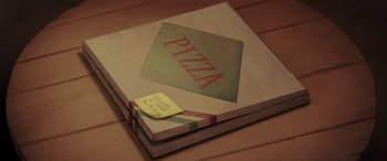 Movie still from “I Lost My Body” (2019), directed by Jérémy Clapin – A box of pizza on a wooden table; Extreme Close Up shot, Overhead angle