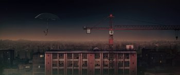 Movie still from “I Lost My Body” (2019), directed by Jérémy Clapin – An image of an urban scene with a crane in the background; Extreme Wide shot, Low angle