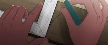 Movie still from “I Lost My Body” (2019), directed by Jérémy Clapin – A pair of hands holding a pencil and ruler; Extreme Close Up shot, Overhead angle