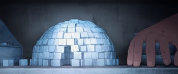 Movie still from “I Lost My Body” (2019), directed by Jérémy Clapin – An igloo made out of ice blocks on a table; Extreme Wide shot, High angle
