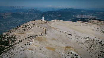 Movie still from “Icarus” (2017), directed by Bryan Fogel – An aerial view of a lighthouse on top of a mountain; Extreme Wide shot, High angle