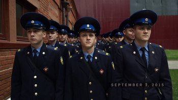 Movie still from “Icarus” (2017), directed by Bryan Fogel – A group of men in military uniforms standing in a row; Medium shot, Low angle