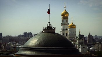 Movie still from “Icarus” (2017), directed by Bryan Fogel – A view of a dome with a flag on top of it; Extreme Wide shot, Low angle