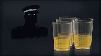 Movie still from “Icarus” (2017), directed by Bryan Fogel – A group of glasses filled with yellow liquid next to a man; Extreme Close Up shot, Overhead angle