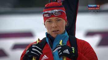 Movie still from “Icarus” (2017), directed by Bryan Fogel – A woman in a red jacket holding a pair of skis; Close Up shot, Over the shoulder angle
