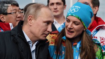 Movie still from “Icarus” (2017), directed by Bryan Fogel – A man and a woman are kissing each other; Close Up shot, Low angle