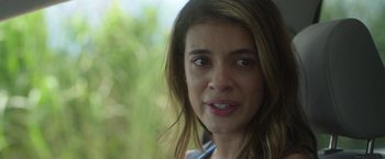 Movie still from “In the Tall Grass” (2019), directed by Vincenzo Natali – A person with long hair; Close Up shot, Over the shoulder angle