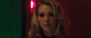 Movie still from “Incarnate” (2016), directed by Brad Peyton – A person with long blonde hair; Close Up shot, Overhead angle