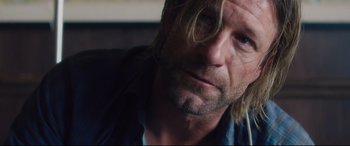 Movie still from “Incarnate” (2016), directed by Brad Peyton – A person with long hair; Close Up shot, Over the shoulder angle