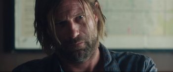Movie still from “Incarnate” (2016), directed by Brad Peyton – A person with long hair; Close Up shot, Over the shoulder angle