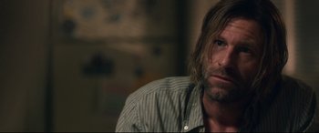 Movie still from “Incarnate” (2016), directed by Brad Peyton – A person with long hair; Close Up shot, Over the shoulder angle