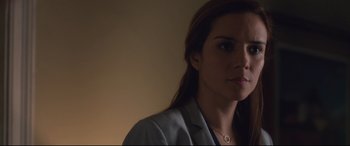 Movie still from “Incarnate” (2016), directed by Brad Peyton – A person wearing a jacket; Close Up shot, Over the shoulder angle