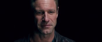 Movie still from “Incarnate” (2016), directed by Brad Peyton – A person wearing a leather jacket; Close Up shot, Over the shoulder angle