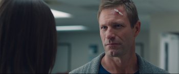 Movie still from “Incarnate” (2016), directed by Brad Peyton – A person looking at a man; Close Up shot, Over the shoulder angle