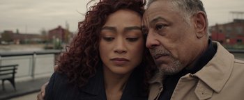 Movie still from “Kaleidoscope” (2023), directed by Mairzee Almas – An older man and a younger woman are looking at each other; Close Up shot, Over the shoulder angle