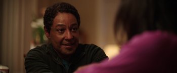 Movie still from “Kaleidoscope” (2023), directed by Mairzee Almas – A person talking to another person; Close Up shot, Over the shoulder angle