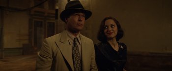 Movie still from “Allied” (2016), directed by Robert Zemeckis – Medium shot, Over the shoulder angle