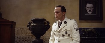 Movie still from “Allied” (2016), directed by Robert Zemeckis – Medium shot, Low angle