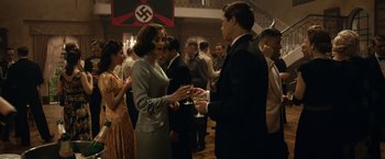 Movie still from “Allied” (2016), directed by Robert Zemeckis – Medium shot, Over the shoulder angle