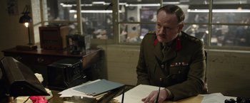 Movie still from “Allied” (2016), directed by Robert Zemeckis – Medium shot, Over the shoulder angle